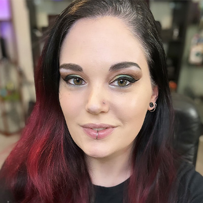 green blue and purple zambies logo